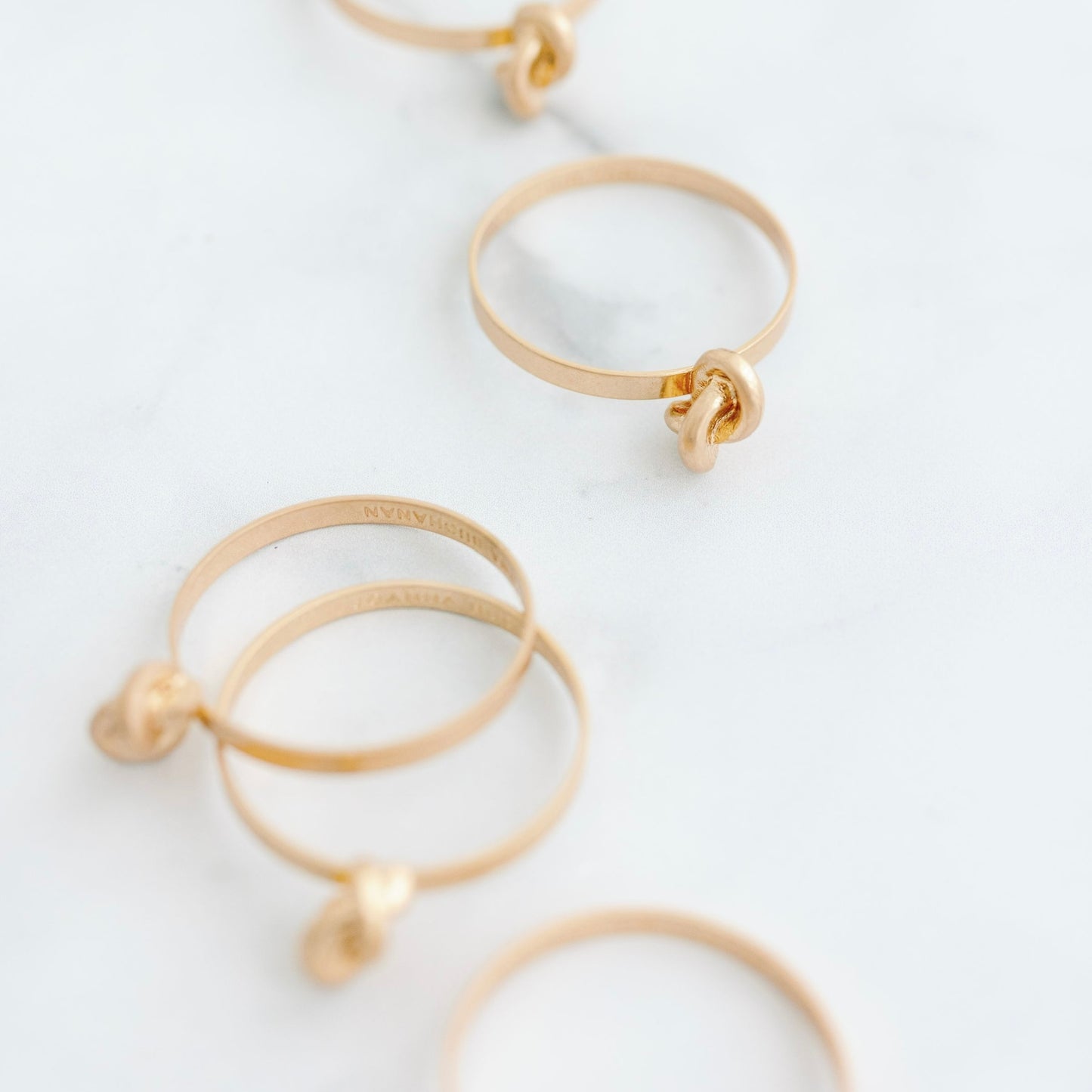 BRASS KNOT NAPKIN RINGS (SET OF 8)